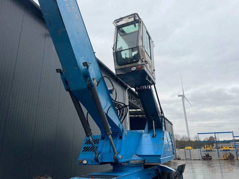 Pelle de manutention pour transport de déchets Fuchs MHL350: photos 11