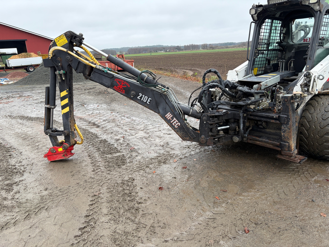 Bobcat HI-Tec 210E - L'équipement de construction: photos 1 Bobcat HI-Tec 210E - L'équipement de construction: photos 1