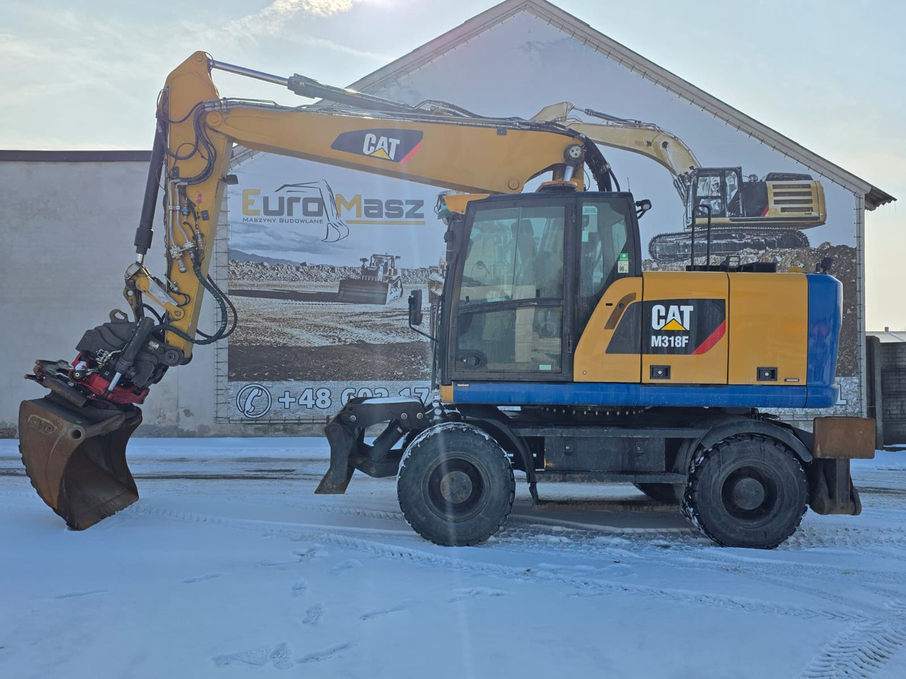 Caterpillar M318F, 2018 ROK, PODPORY + PŁUG, ROTOTILT - Pelle sur pneus: photos 2 Caterpillar M318F, 2018 ROK, PODPORY + PŁUG, ROTOTILT - Pelle sur pneus: photos 2