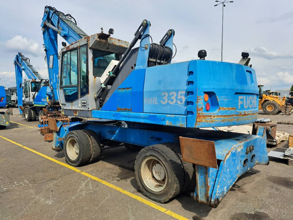 Fuchs MHL335 + Grapple + Reman Engine - Pelle de manutention: photos 4 Fuchs MHL335 + Grapple + Reman Engine - Pelle de manutention: photos 4