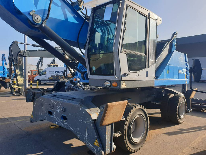Pelle de manutention pour transport de déchets Fuchs MHL350D: photos 7