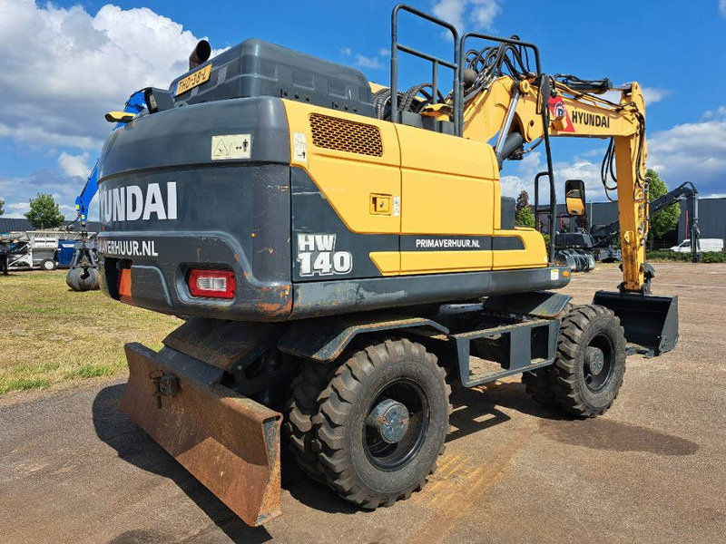 Hyundai HW140 - Pelle sur pneus: photos 3 Hyundai HW140 - Pelle sur pneus: photos 3