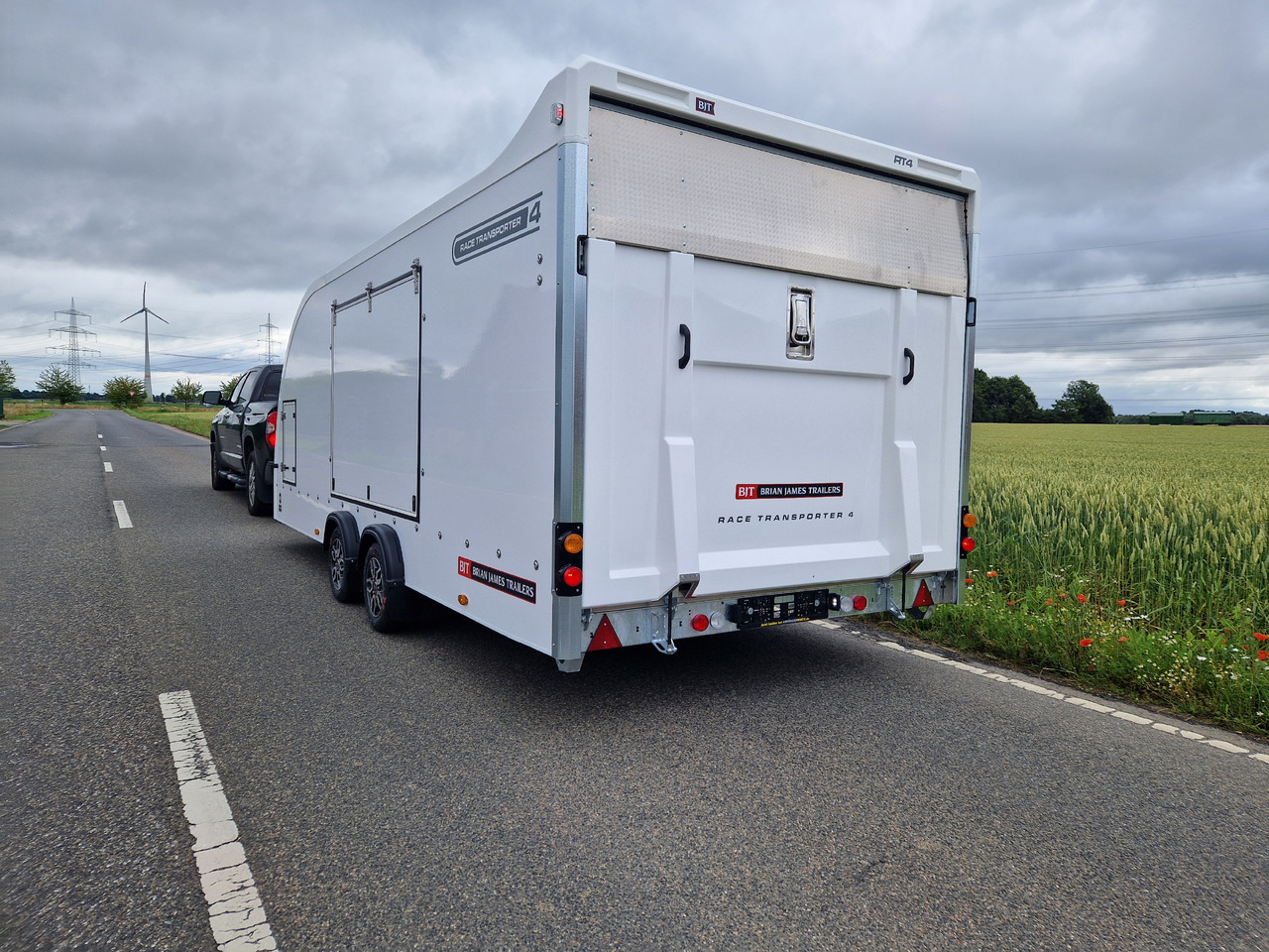 Remorque porte-voitures BJT Race Transporter 4 550x212x188cm weiss E Winde Frontstauraum ASR Alufelgen dark 3500kg Modell 24: photos 14