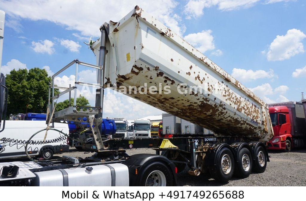 Schmitz Cargobull SKI 24 Stahl *24m³ / 1.Liftachse / Rollplane Schmitz Cargobull SKI 24 Stahl *24m³ / 1.Liftachse / Rollplane - Semi-remorque benne: photos 1 Schmitz Cargobull SKI 24 Stahl *24m³ / 1.Liftachse / Rollplane Schmitz Cargobull SKI 24 Stahl *24m³ / 1.Liftachse / Rollplane - Semi-remorque benne: photos 1