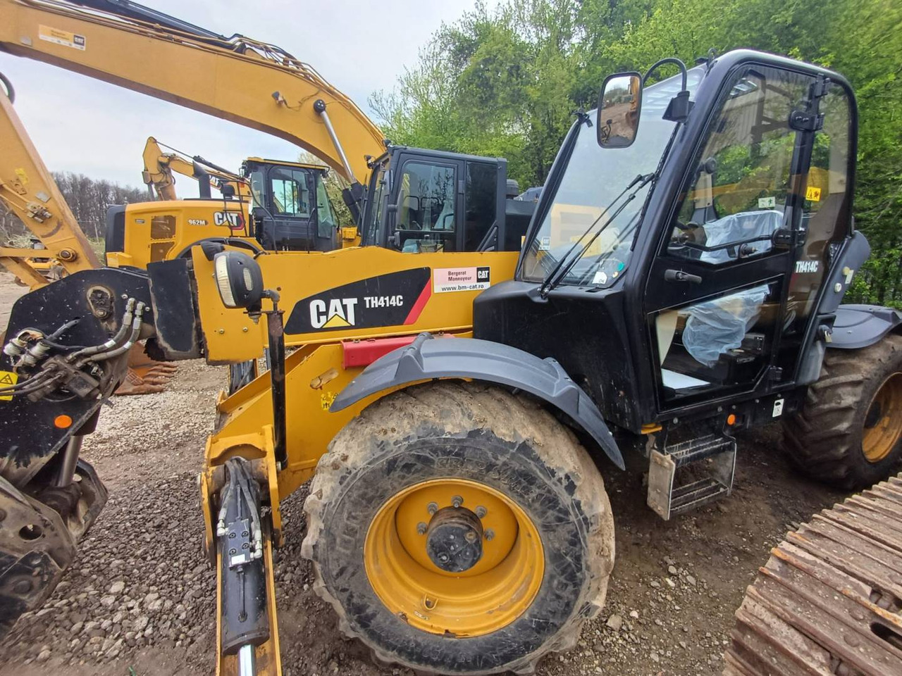 CAT TH414C - Chariot télescopique: photos 1 CAT TH414C - Chariot télescopique: photos 1