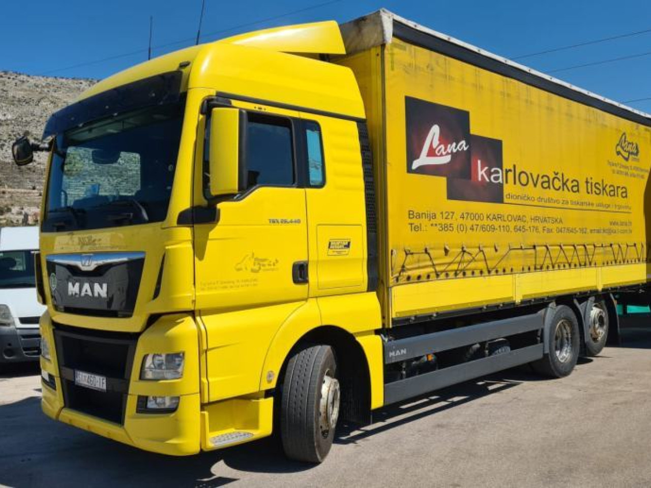MAN TGX 26.440 - Camion à rideaux coulissants: photos 1 MAN TGX 26.440 - Camion à rideaux coulissants: photos 1