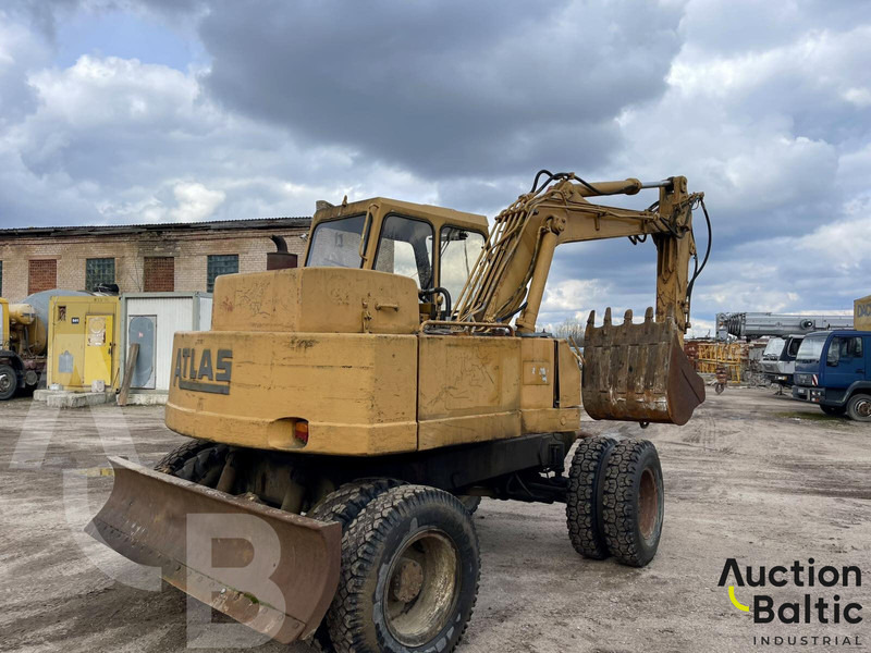 Atlas 1204 - Pelle sur pneus: photos 4 Atlas 1204 - Pelle sur pneus: photos 4