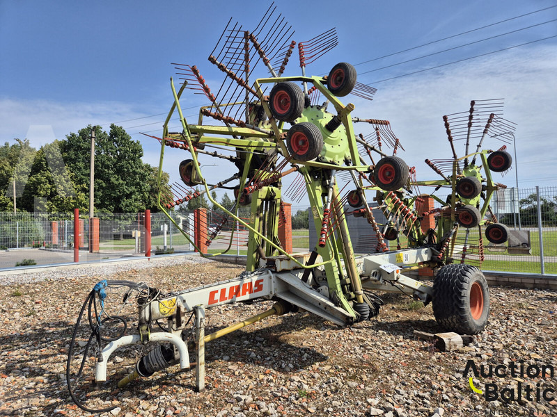 Claas Liner 3000 - Faneuse: photos 1 Claas Liner 3000 - Faneuse: photos 1
