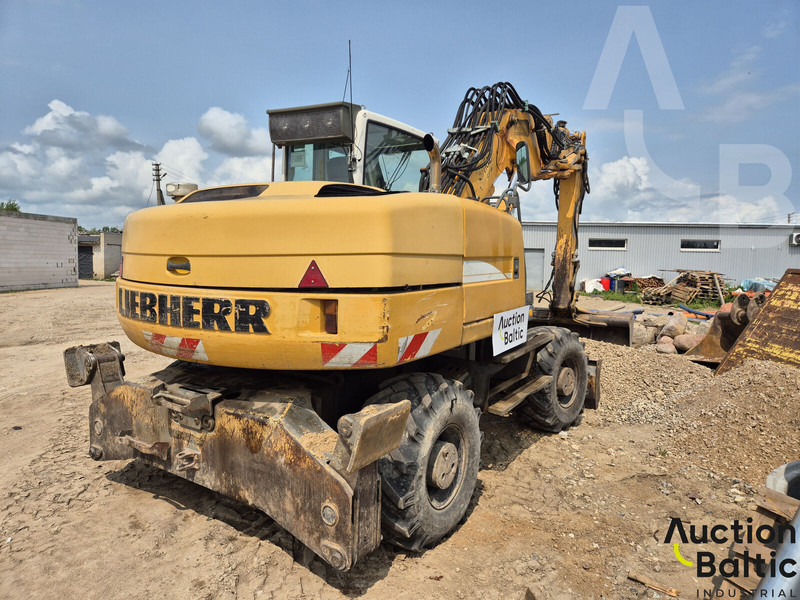Liebherr A 316 Litronic - Pelle sur pneus: photos 3 Liebherr A 316 Litronic - Pelle sur pneus: photos 3