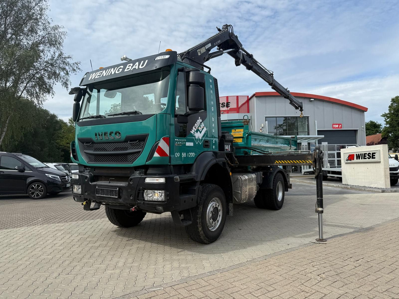 Iveco AD190 T/W Trakker 410 4x4 Allrad Kran KipperHIAB - Camion benne, Camion grue: photos 1 Iveco AD190 T/W Trakker 410 4x4 Allrad Kran KipperHIAB - Camion benne, Camion grue: photos 1