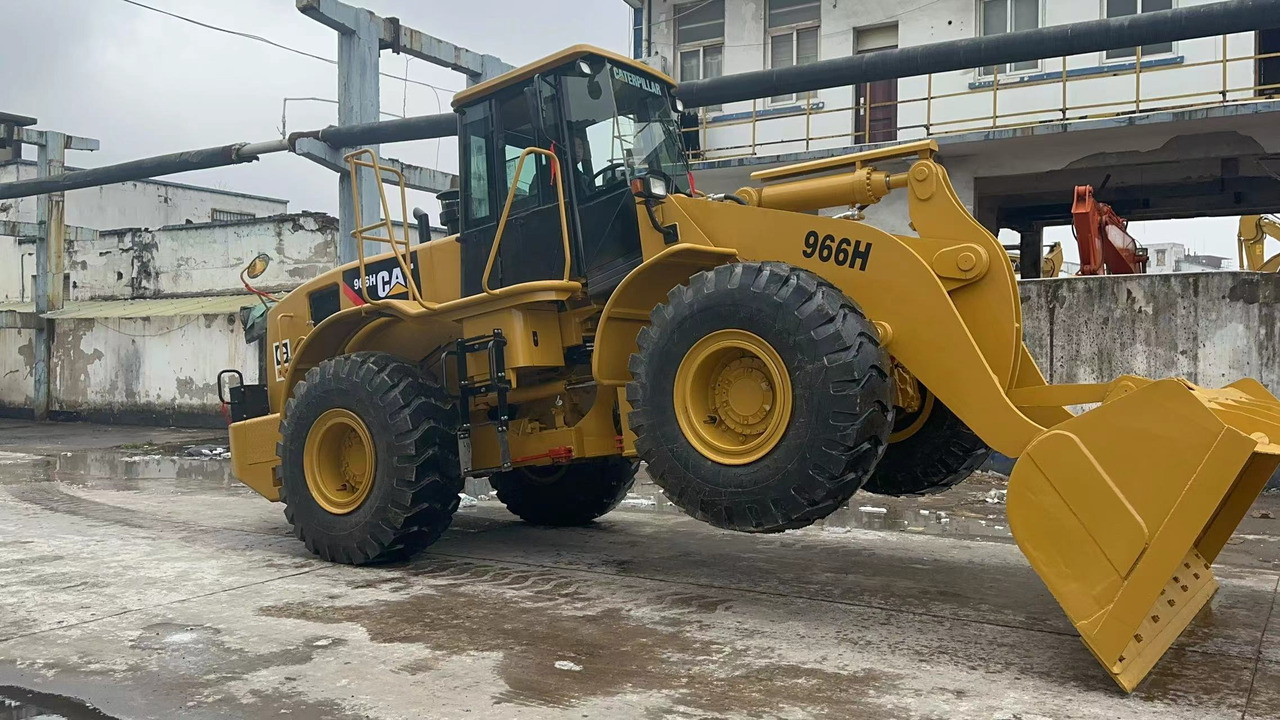 CATERPILLAR 966H - Pelle sur pneus: photos 1 CATERPILLAR 966H - Pelle sur pneus: photos 1