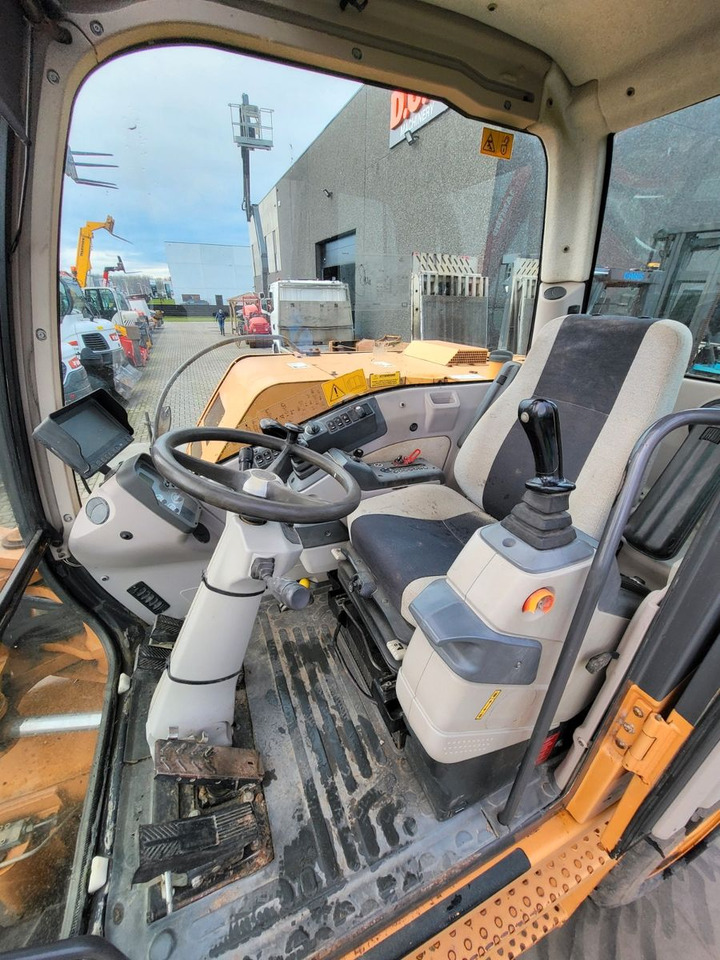 Pelle sur pneus Case WX125: photos 10 Pelle sur pneus Case WX125: photos 10