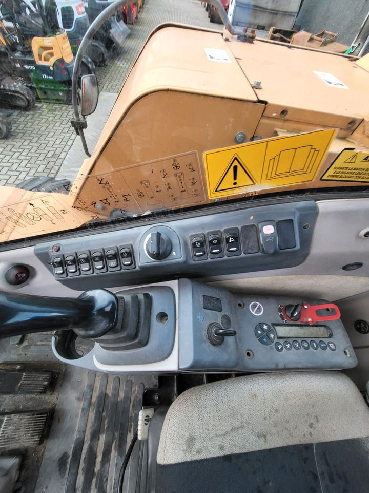 Pelle sur pneus Case WX125: photos 12 Pelle sur pneus Case WX125: photos 12