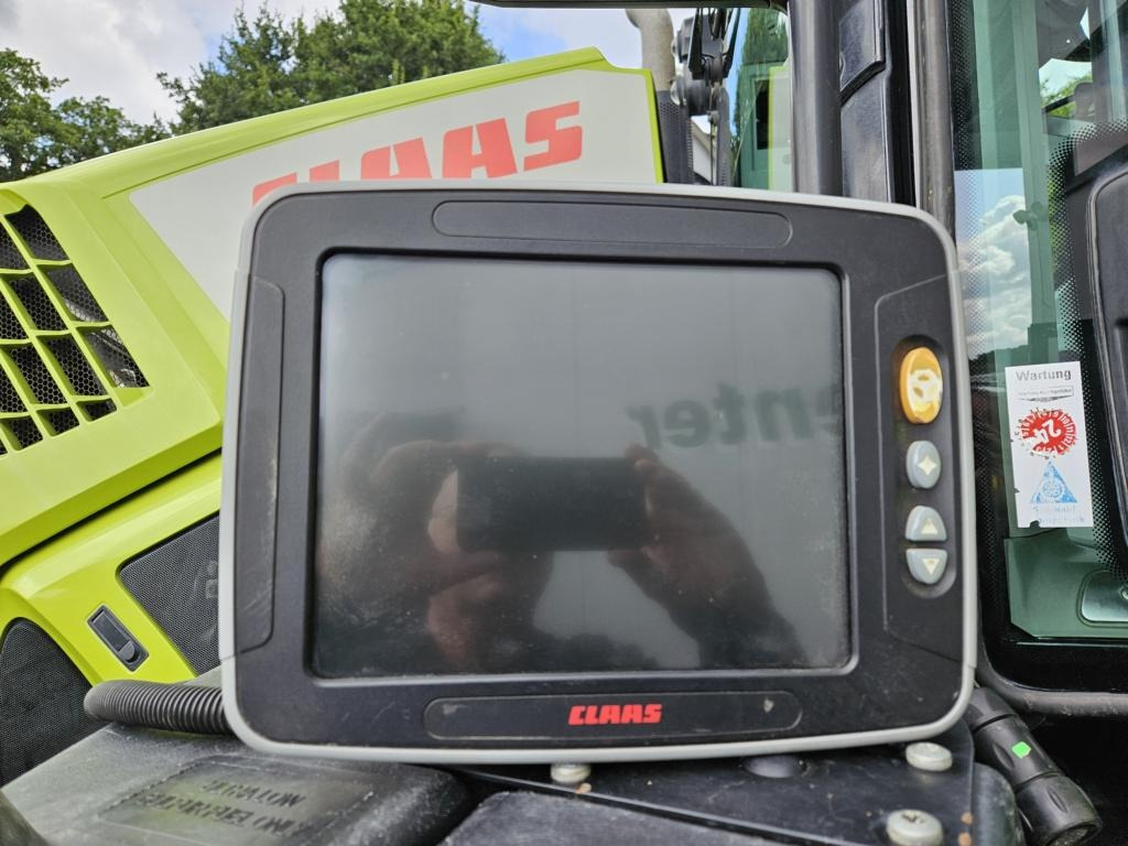 Tracteur agricole CLAAS AXION 870 CMATIC: photos 6 Tracteur agricole CLAAS AXION 870 CMATIC: photos 6