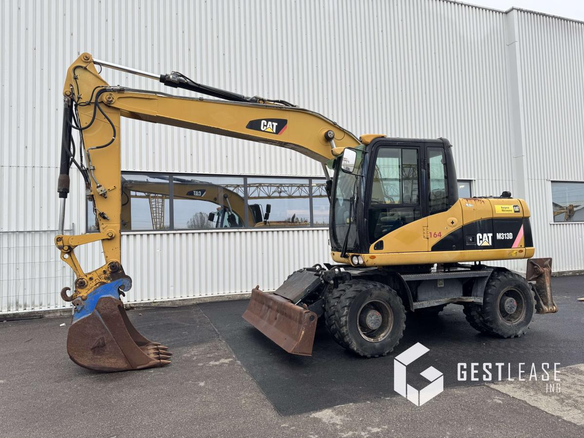 Caterpillar M313D Mono - Pelle sur pneus: photos 1 Caterpillar M313D Mono - Pelle sur pneus: photos 1