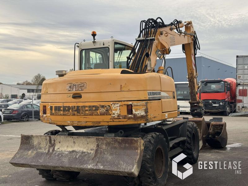 Liebherr A312 Litronic - Pelle sur pneus: photos 3 Liebherr A312 Litronic - Pelle sur pneus: photos 3