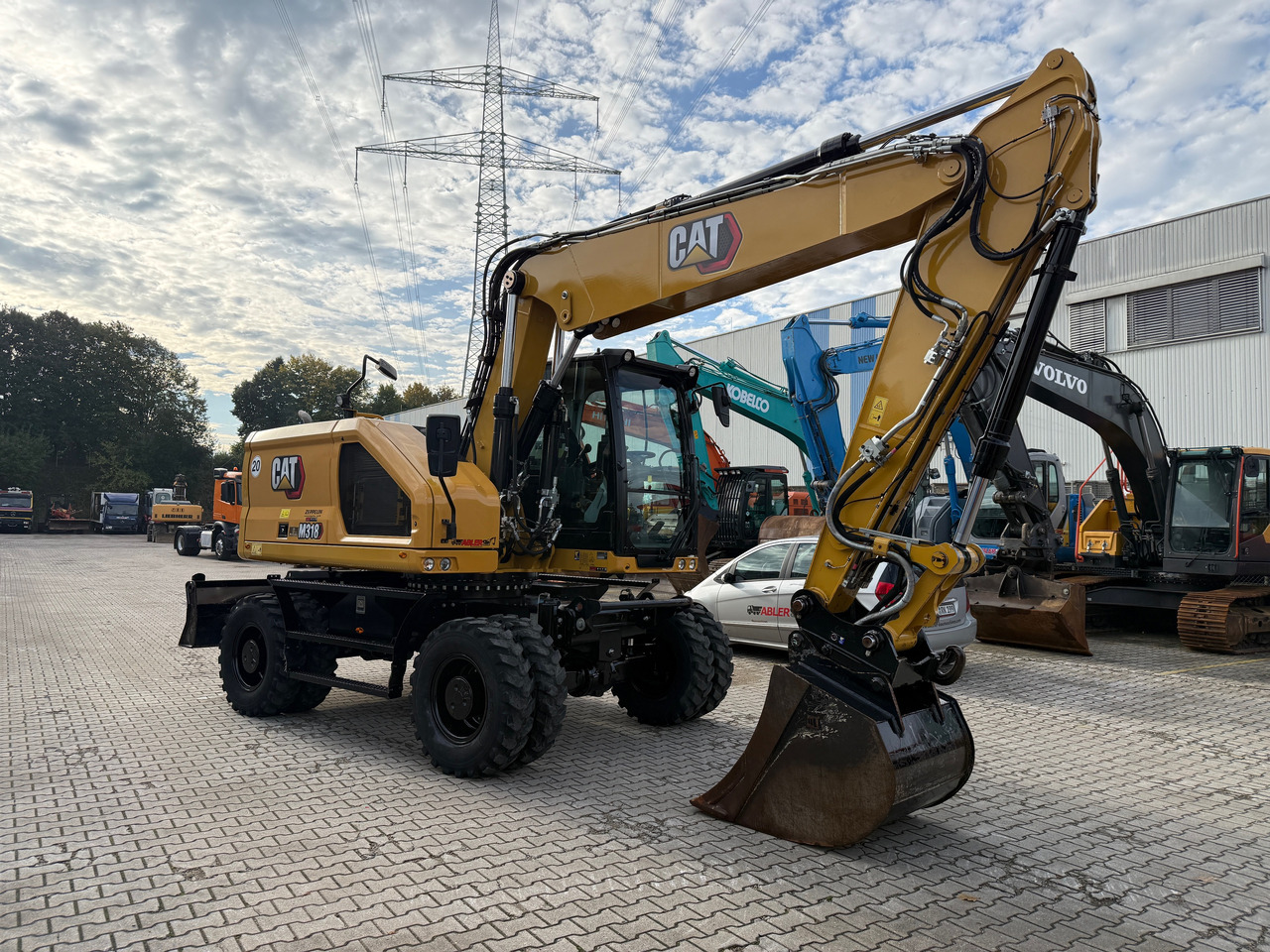 CATERPILLAR M318 NEW GEN Mobilbagger OQ65 ZS - Pelle: photos 3 CATERPILLAR M318 NEW GEN Mobilbagger OQ65 ZS - Pelle: photos 3