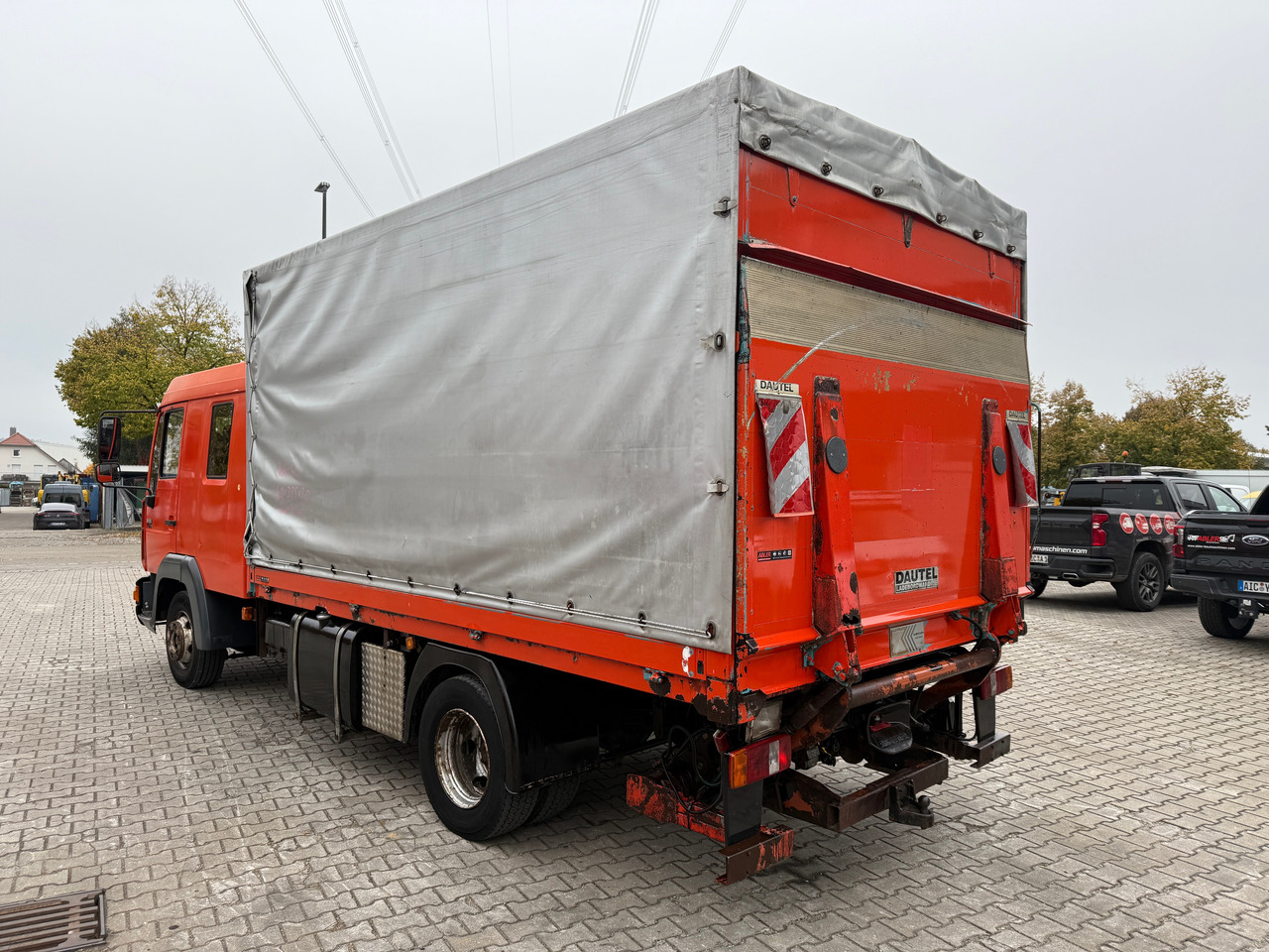 MAN 8.174 Pritsche+Plane+Ladebordwand DOKA L2000 - Camion à rideaux coulissants: photos 5 MAN 8.174 Pritsche+Plane+Ladebordwand DOKA L2000 - Camion à rideaux coulissants: photos 5