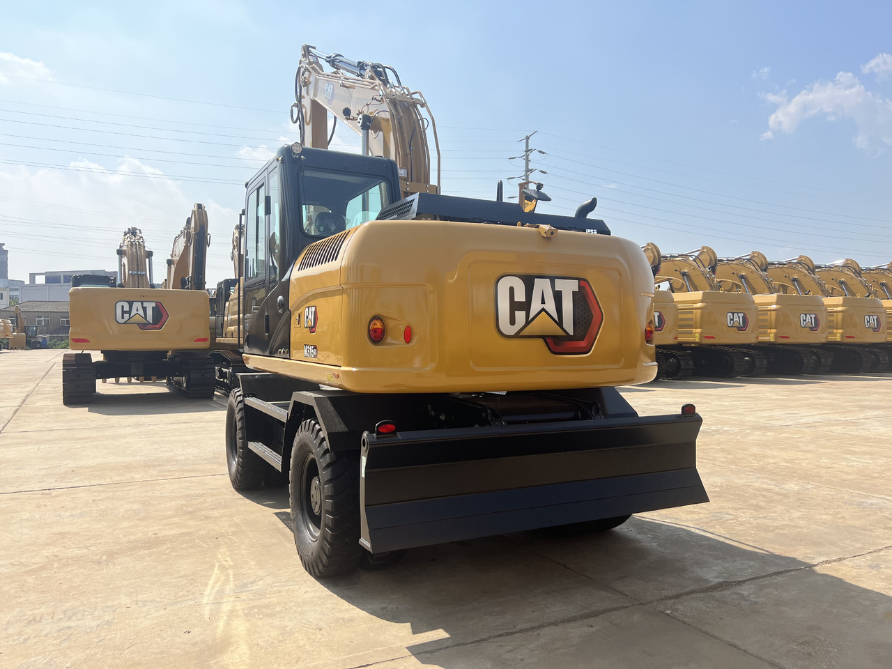 Pelle sur pneus neuf Caterpillar M315GC: photos 6