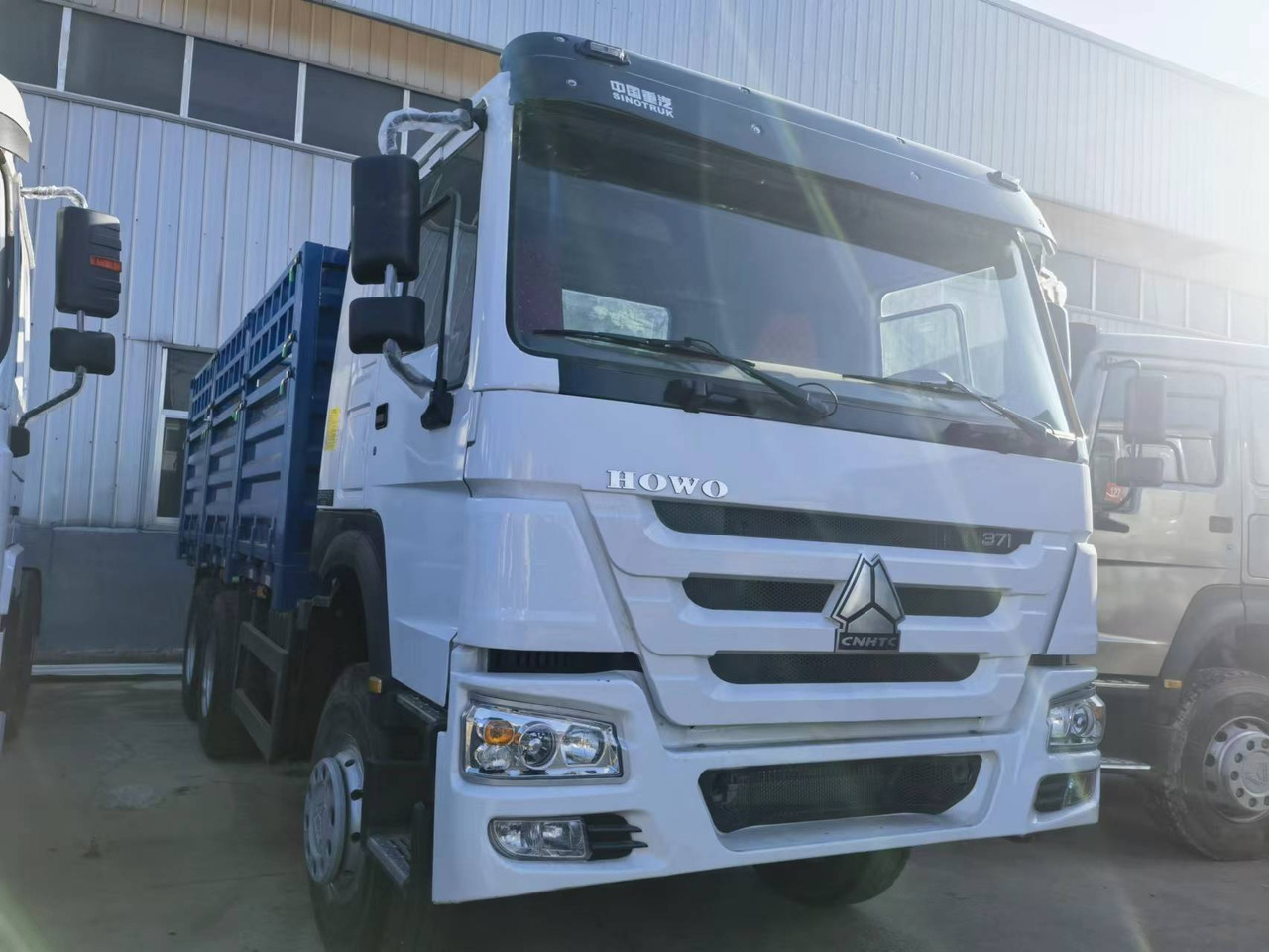 Sinotruk HOWO 371 6*4 Fence truck - Camion plateau: photos 1 Sinotruk HOWO 371 6*4 Fence truck - Camion plateau: photos 1