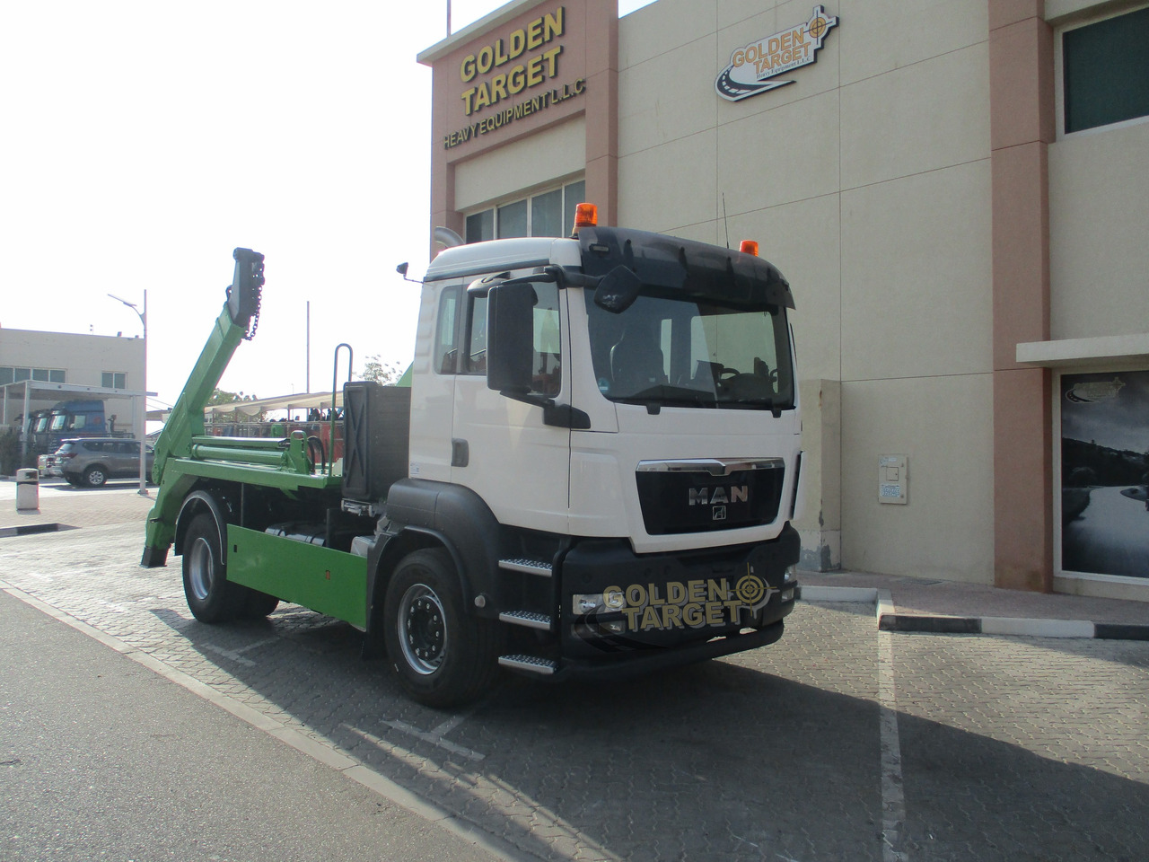 MAN TGS 18.440 4x2 Skip Loader - Camion multibenne: photos 1 MAN TGS 18.440 4x2 Skip Loader - Camion multibenne: photos 1