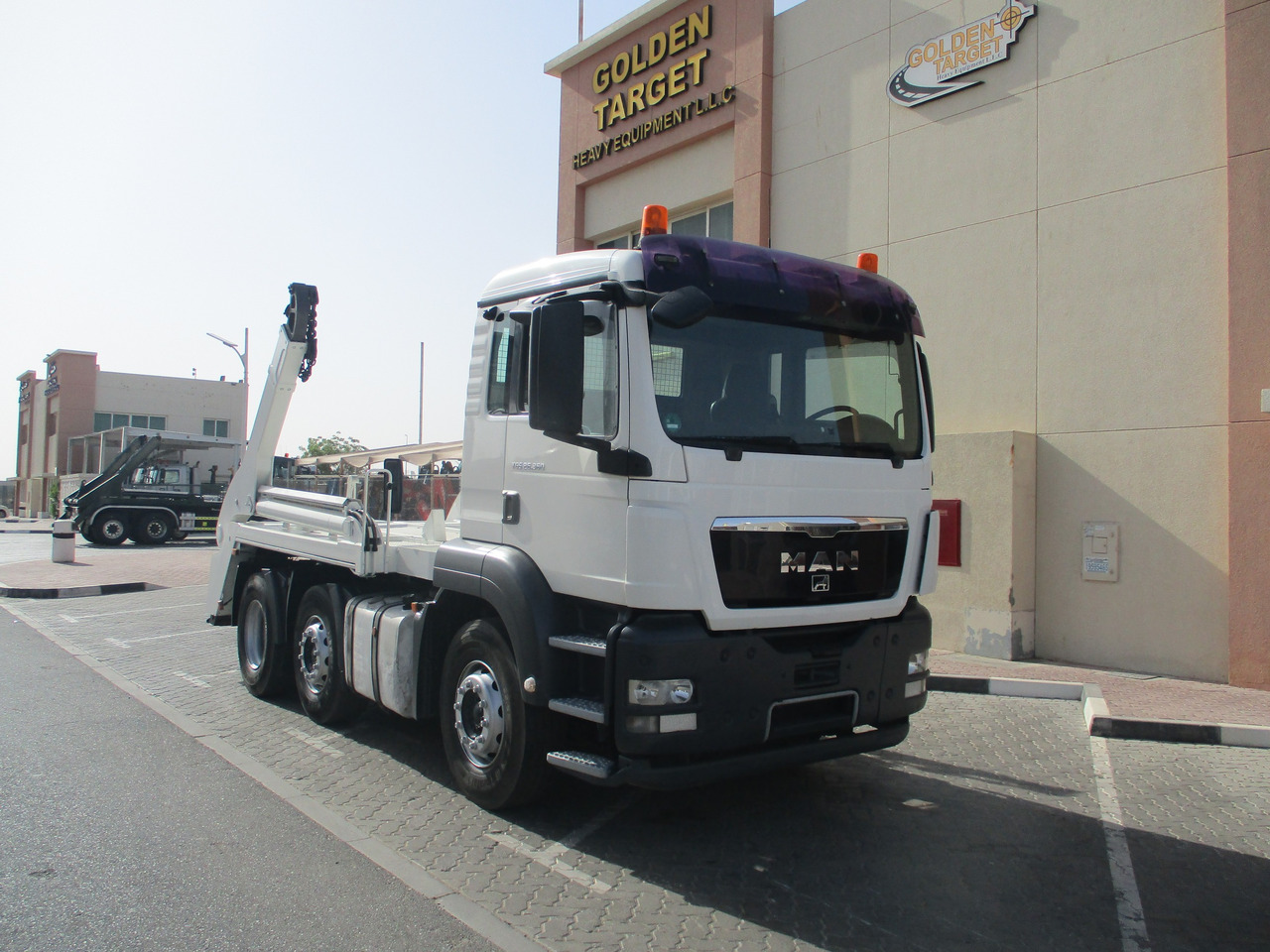 MAN TGS 26.360 6x2 Skip Loader - Camion multibenne: photos 1 MAN TGS 26.360 6x2 Skip Loader - Camion multibenne: photos 1