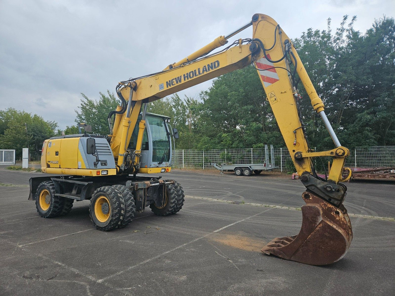 New Holland MH Plus 18t Mobilbagger - Pelle sur pneus: photos 1 New Holland MH Plus 18t Mobilbagger - Pelle sur pneus: photos 1