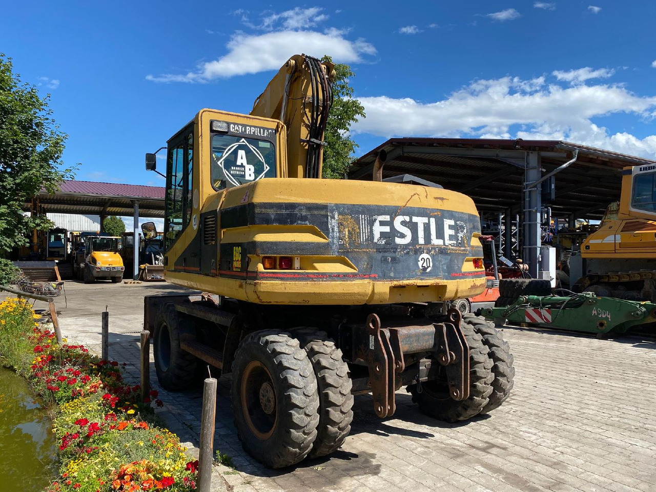 Caterpillar M 312 - Pelle sur pneus: photos 5 Caterpillar M 312 - Pelle sur pneus: photos 5