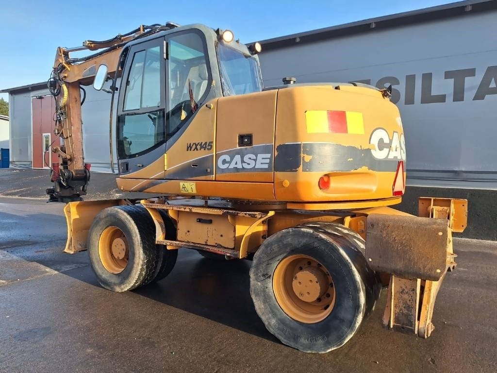 Case WX145 PYÖRITTÄJÄLLÄ  - Pelle sur pneus: photos 2 Case WX145 PYÖRITTÄJÄLLÄ  - Pelle sur pneus: photos 2