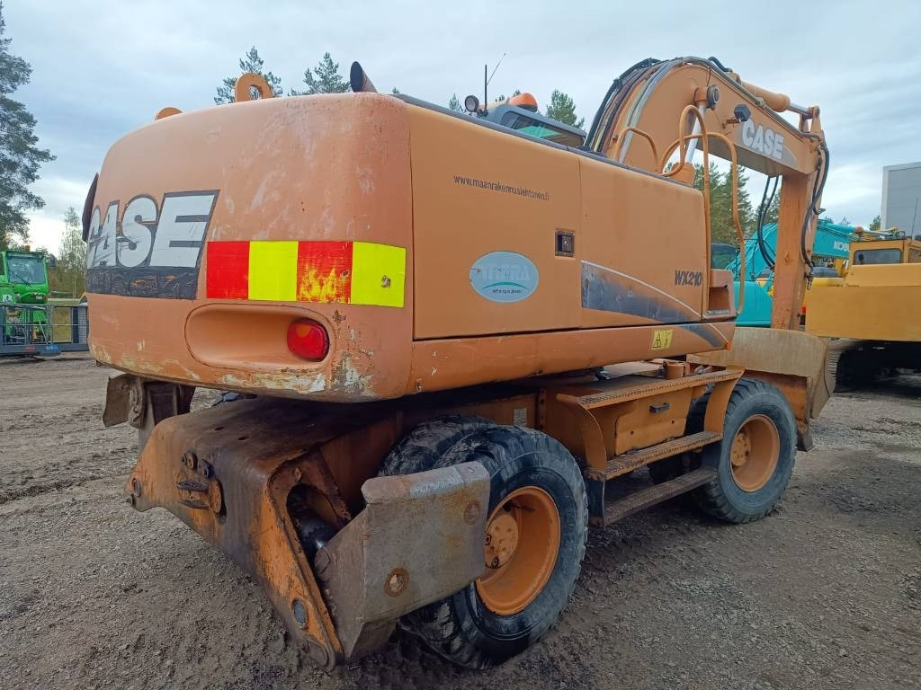 Case WX210 PYÖRITTÄJÄLLÄ  - Pelle sur pneus: photos 4 Case WX210 PYÖRITTÄJÄLLÄ  - Pelle sur pneus: photos 4