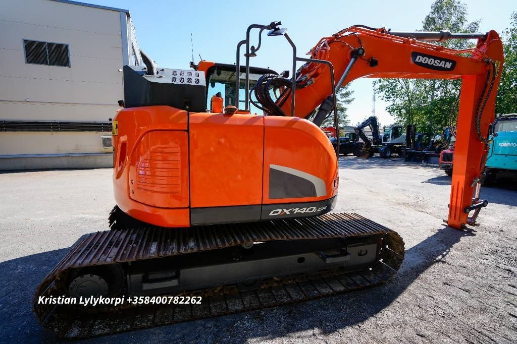Pelle sur chenille Doosan DX140LCR-5: photos 7