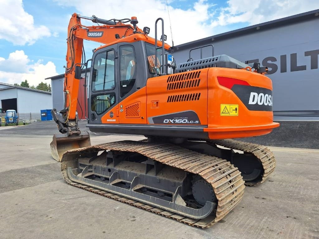 Doosan DX160LCH-5 METSÄMALLI KALLISTAJALLA  - Pelle sur chenille: photos 2 Doosan DX160LCH-5 METSÄMALLI KALLISTAJALLA  - Pelle sur chenille: photos 2
