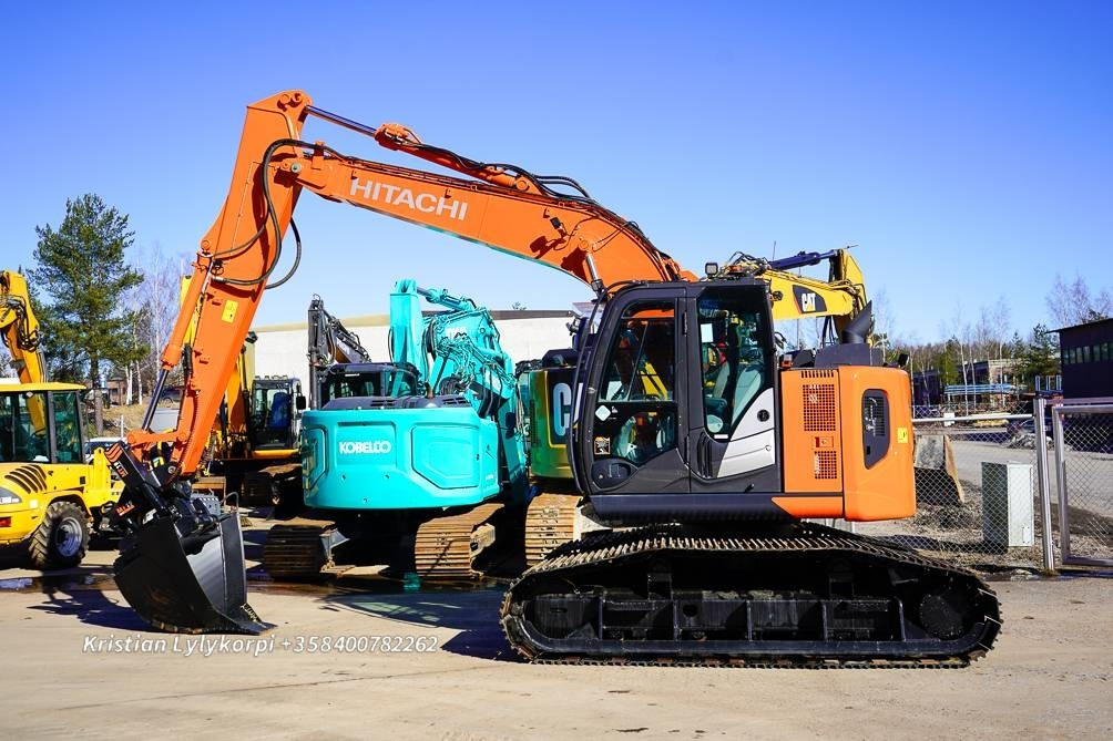 Hitachi ZX135US-6 METSÄALUSTALLA - Pelle sur chenille: photos 1 Hitachi ZX135US-6 METSÄALUSTALLA - Pelle sur chenille: photos 1
