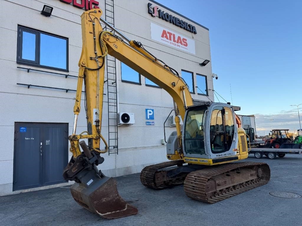 New Holland E 135 SR LC - Pelle sur chenille: photos 2 New Holland E 135 SR LC - Pelle sur chenille: photos 2