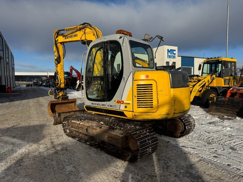 New Holland MYYTY! SOLD! E80MSR PYÖRITTÄJÄLLÄ - Mini pelle: photos 3 New Holland MYYTY! SOLD! E80MSR PYÖRITTÄJÄLLÄ - Mini pelle: photos 3