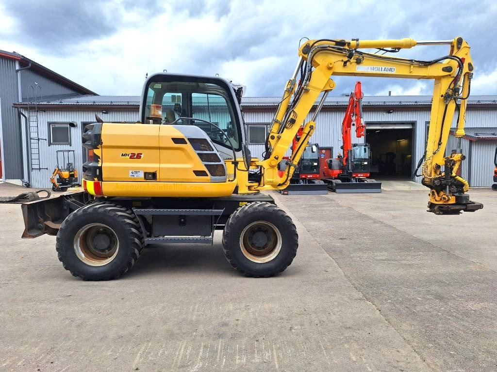 New Holland MYYTY! SOLD! MH2.6 ENGCON PIHDEILLÄ - Pelle sur pneus: photos 5 New Holland MYYTY! SOLD! MH2.6 ENGCON PIHDEILLÄ - Pelle sur pneus: photos 5