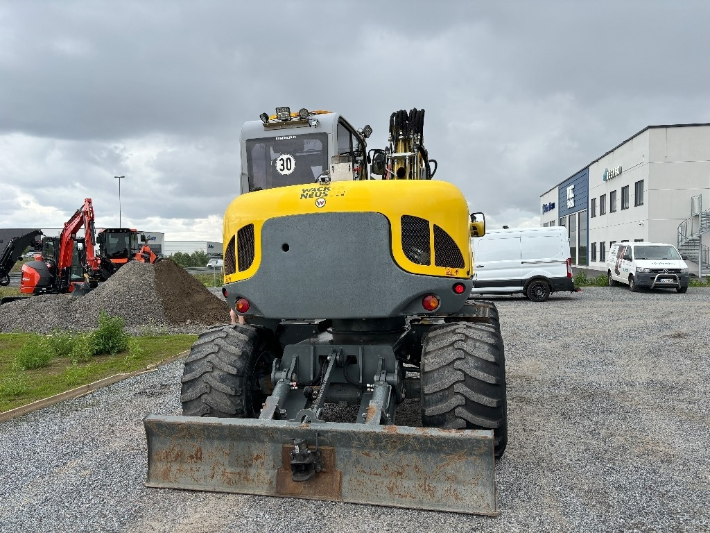 Wacker Neuson EW 100 - Pelle sur pneus: photos 3 Wacker Neuson EW 100 - Pelle sur pneus: photos 3