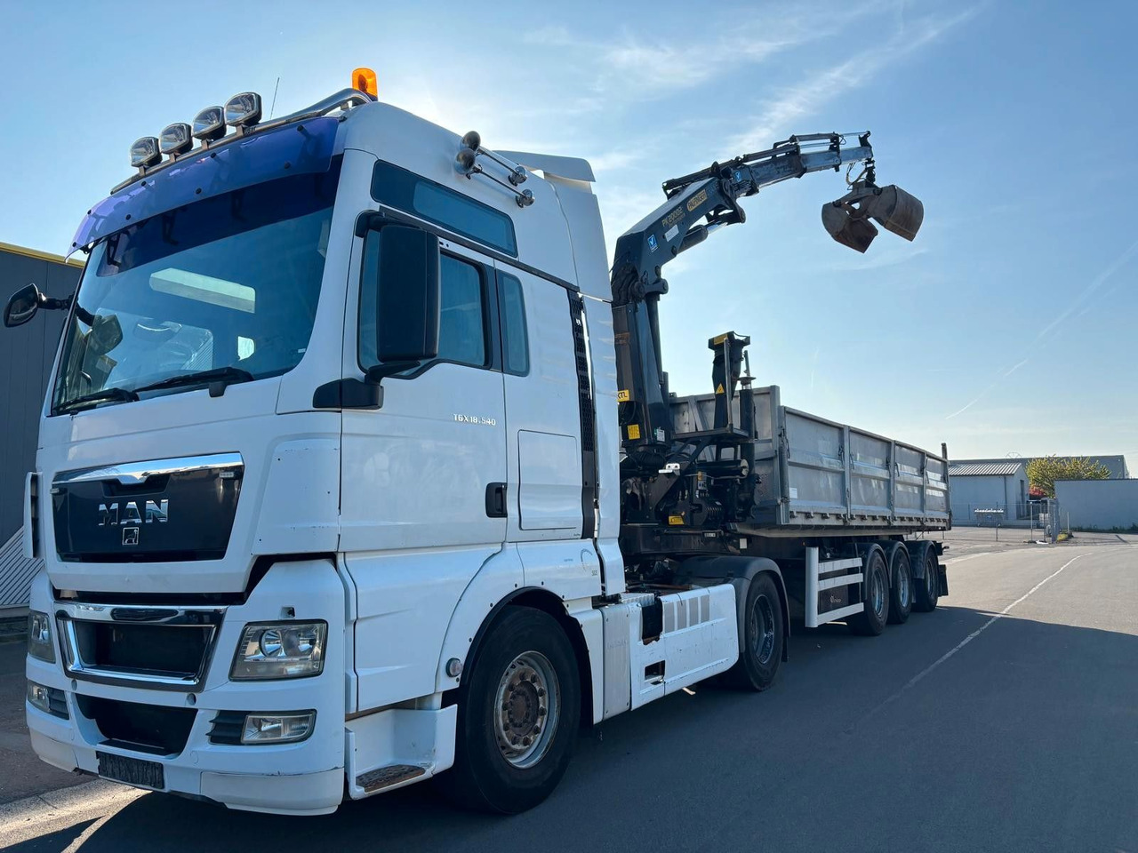 MAN TGX 18.540. Kipper + Kran PK20002. - Camion grue: photos 2 MAN TGX 18.540. Kipper + Kran PK20002. - Camion grue: photos 2