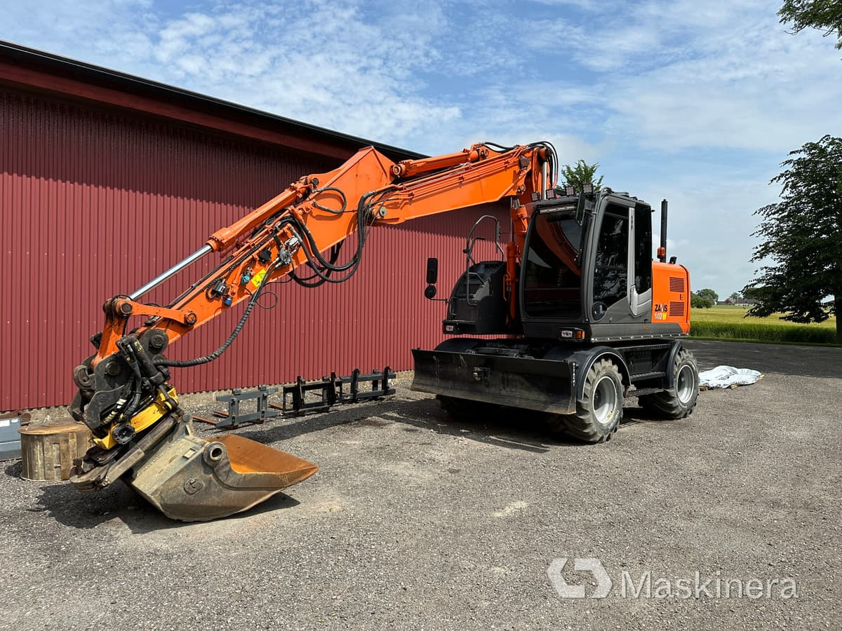 Hjulgrävare Hitachi ZX140W-3 - Pelle sur chenille: photos 1 Hjulgrävare Hitachi ZX140W-3 - Pelle sur chenille: photos 1