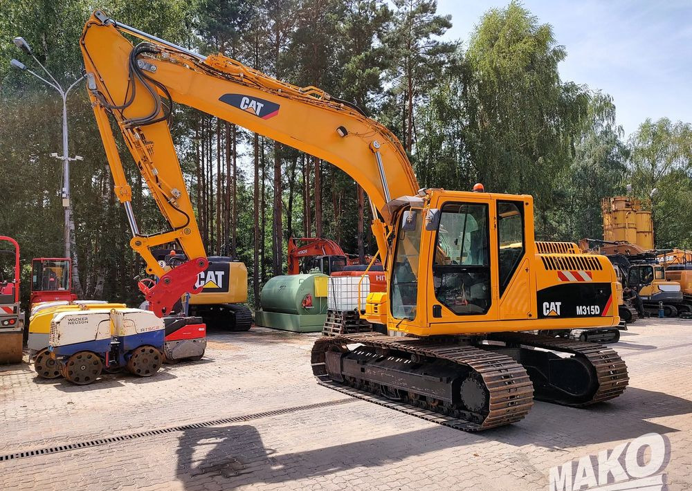 Caterpillar 315D - Pelle sur chenille: photos 1 Caterpillar 315D - Pelle sur chenille: photos 1