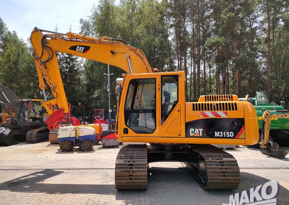 Caterpillar 315D - Pelle sur chenille: photos 2 Caterpillar 315D - Pelle sur chenille: photos 2