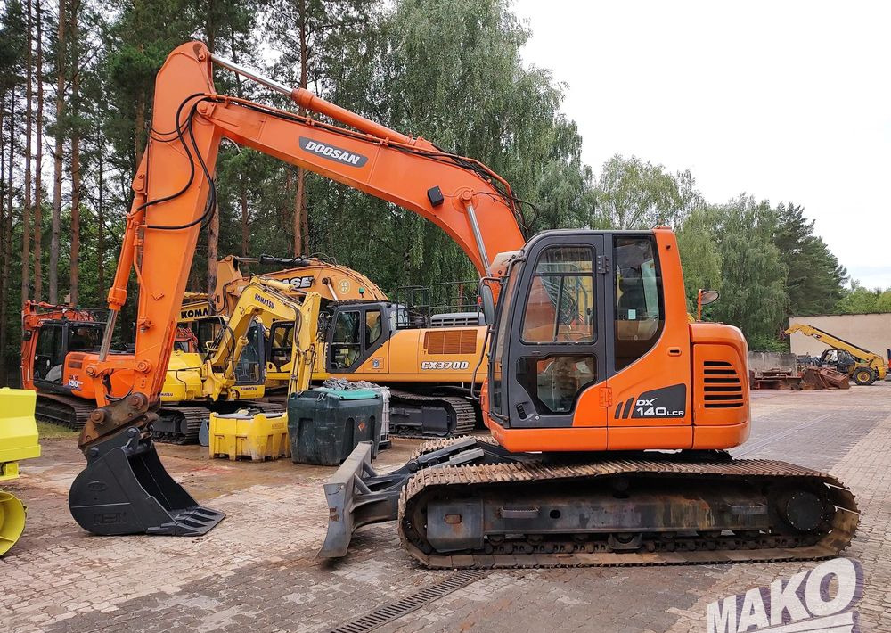 Doosan DX140LCR - Pelle sur chenille: photos 1 Doosan DX140LCR - Pelle sur chenille: photos 1
