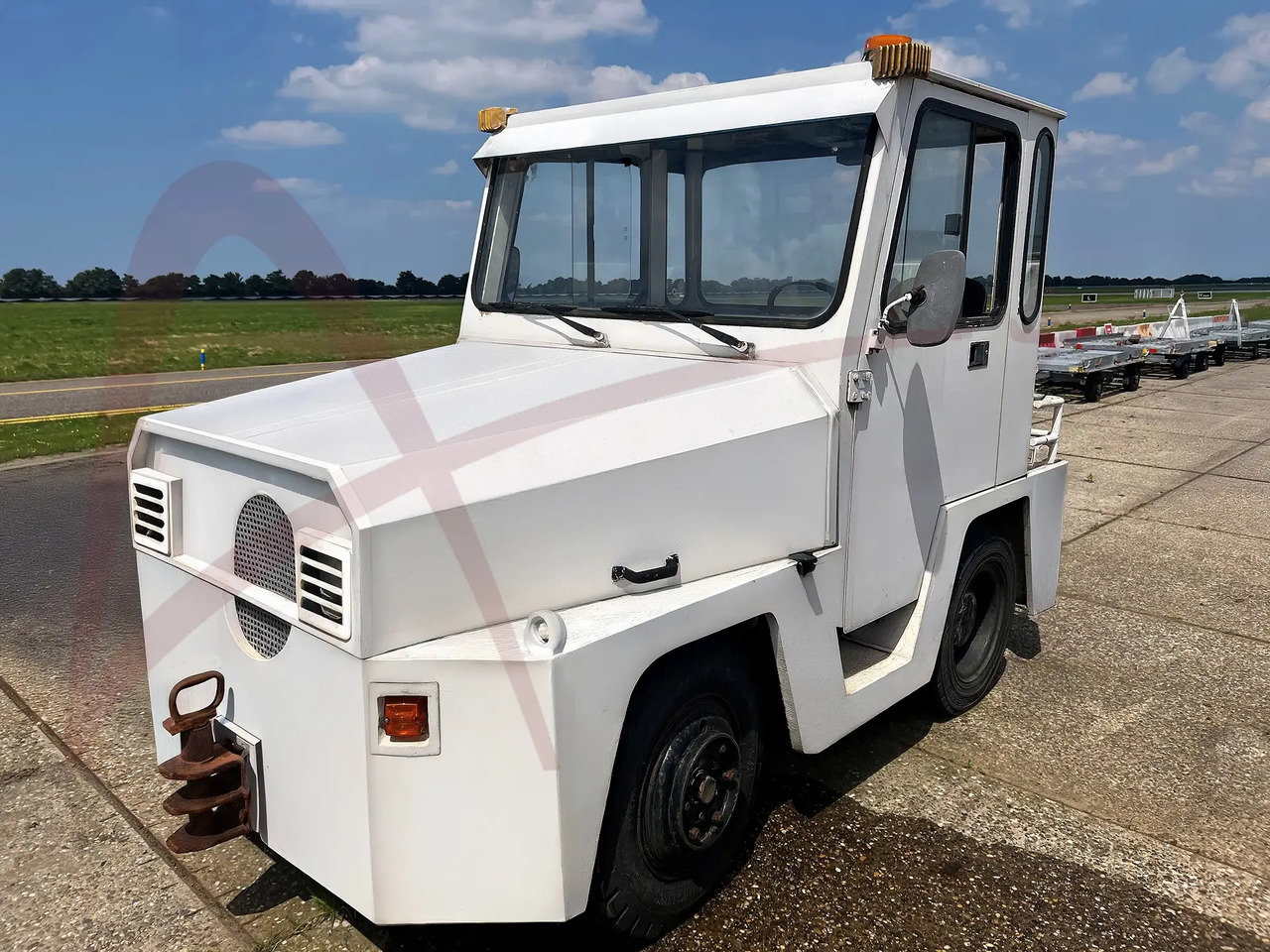 Mulag Comet 5 - Tracteur à bagages: photos 1 Mulag Comet 5 - Tracteur à bagages: photos 1