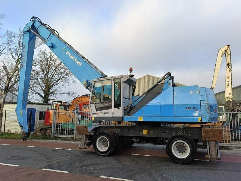 Fuchs MHL 350 industry waste handler umslagbagger - Pelle de manutention: photos 4 Fuchs MHL 350 industry waste handler umslagbagger - Pelle de manutention: photos 4