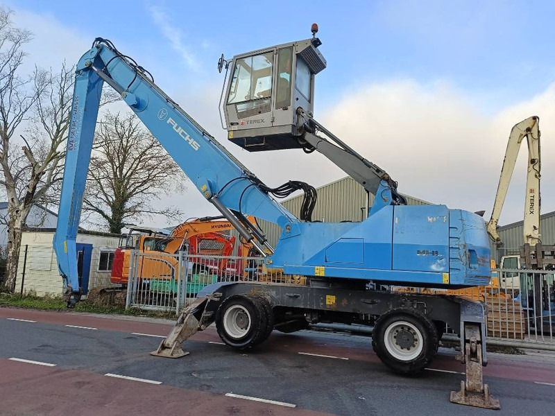 Fuchs MHL 350 industry waste handler umslagbagger - Pelle de manutention: photos 1 Fuchs MHL 350 industry waste handler umslagbagger - Pelle de manutention: photos 1