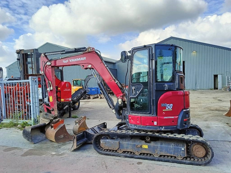 Yanmar Vio 50 -6b vio50 rupskraan excavator bagger track - Mini pelle: photos 1 Yanmar Vio 50 -6b vio50 rupskraan excavator bagger track - Mini pelle: photos 1