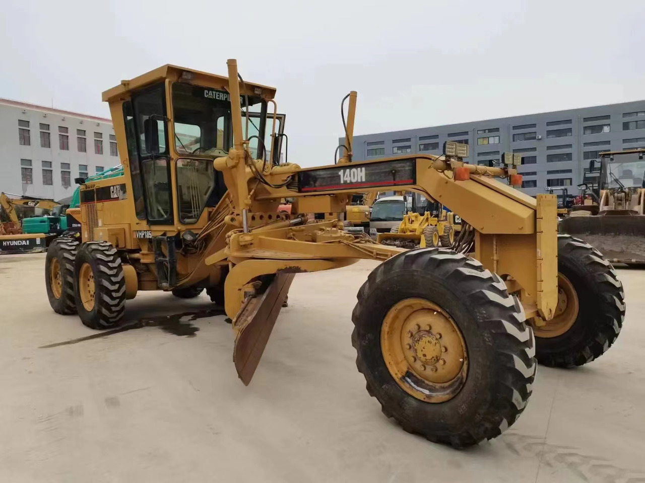 Caterpillar Original Color Motor Grader Used CAT 140H - Niveleuse: photos 2 Caterpillar Original Color Motor Grader Used CAT 140H - Niveleuse: photos 2