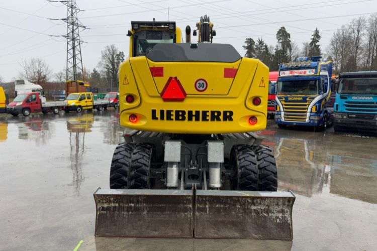 Liebherr 910 Compact Litronic Powertilt - Pelle sur pneus: photos 5 Liebherr 910 Compact Litronic Powertilt - Pelle sur pneus: photos 5