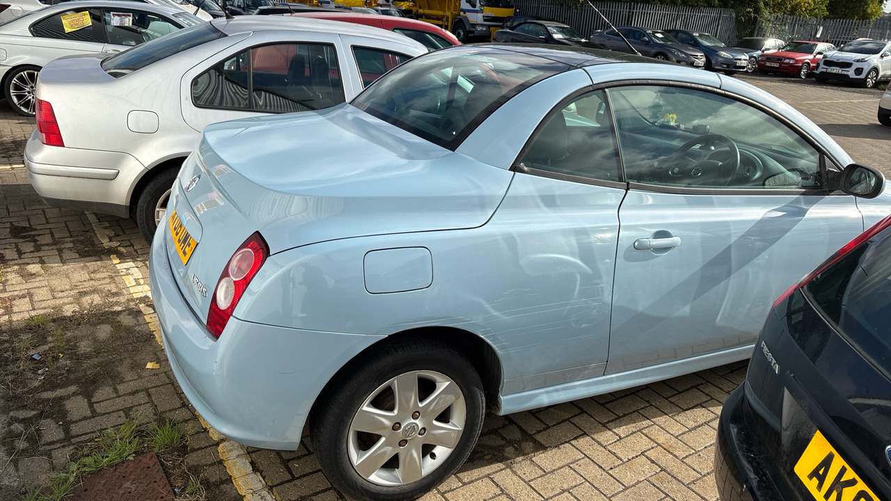 NISSAN MICRA C + C 1.4 URBIS - Voiture: photos 4 NISSAN MICRA C + C 1.4 URBIS - Voiture: photos 4