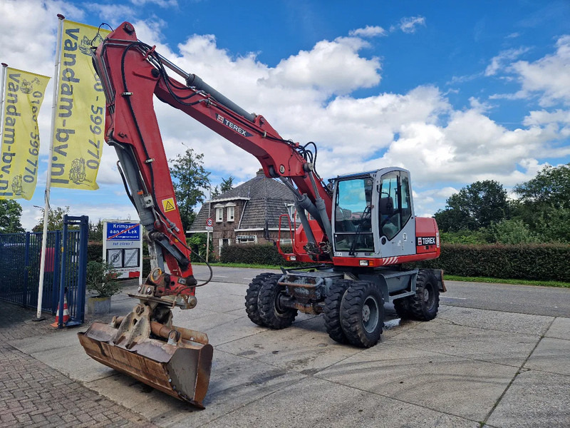 Terex TW160 inclusief kantelbak (1.98m.) - Pelle sur pneus: photos 1 Terex TW160 inclusief kantelbak (1.98m.) - Pelle sur pneus: photos 1